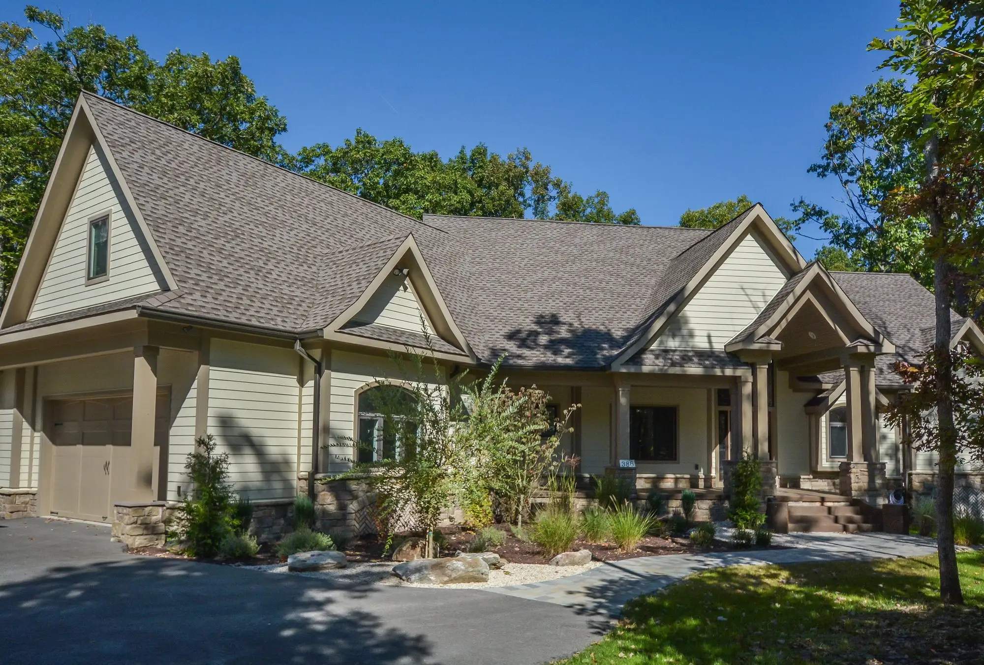 Woodland Chalet exterior in its wooded Deep Creek Lake setting
