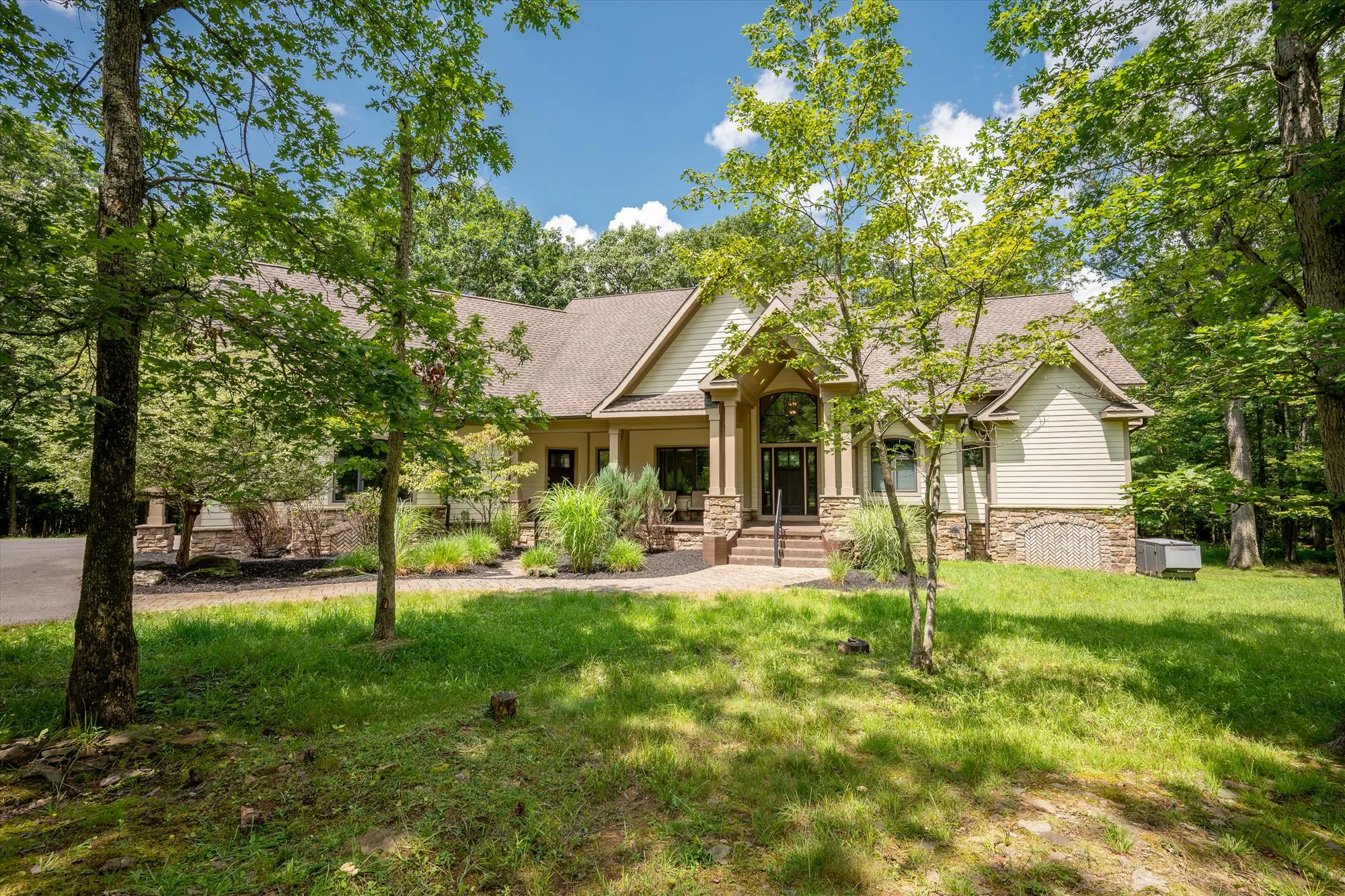 Woodland Chalet exterior detail with architectural features and woodland backdrop