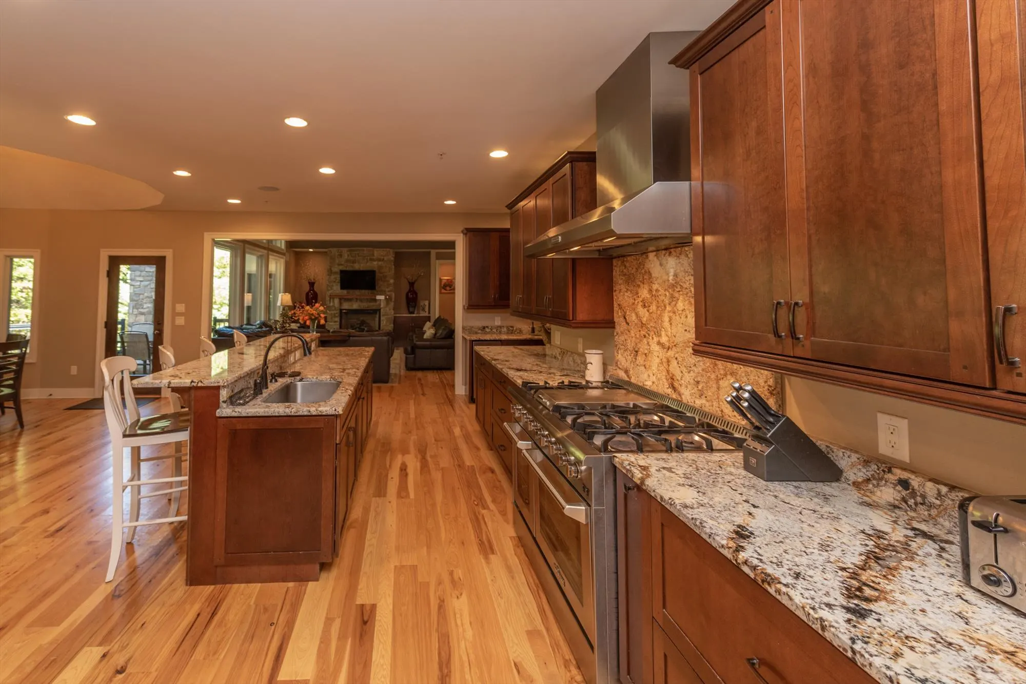 Fully equipped main kitchen with modern appliances and ample counter space