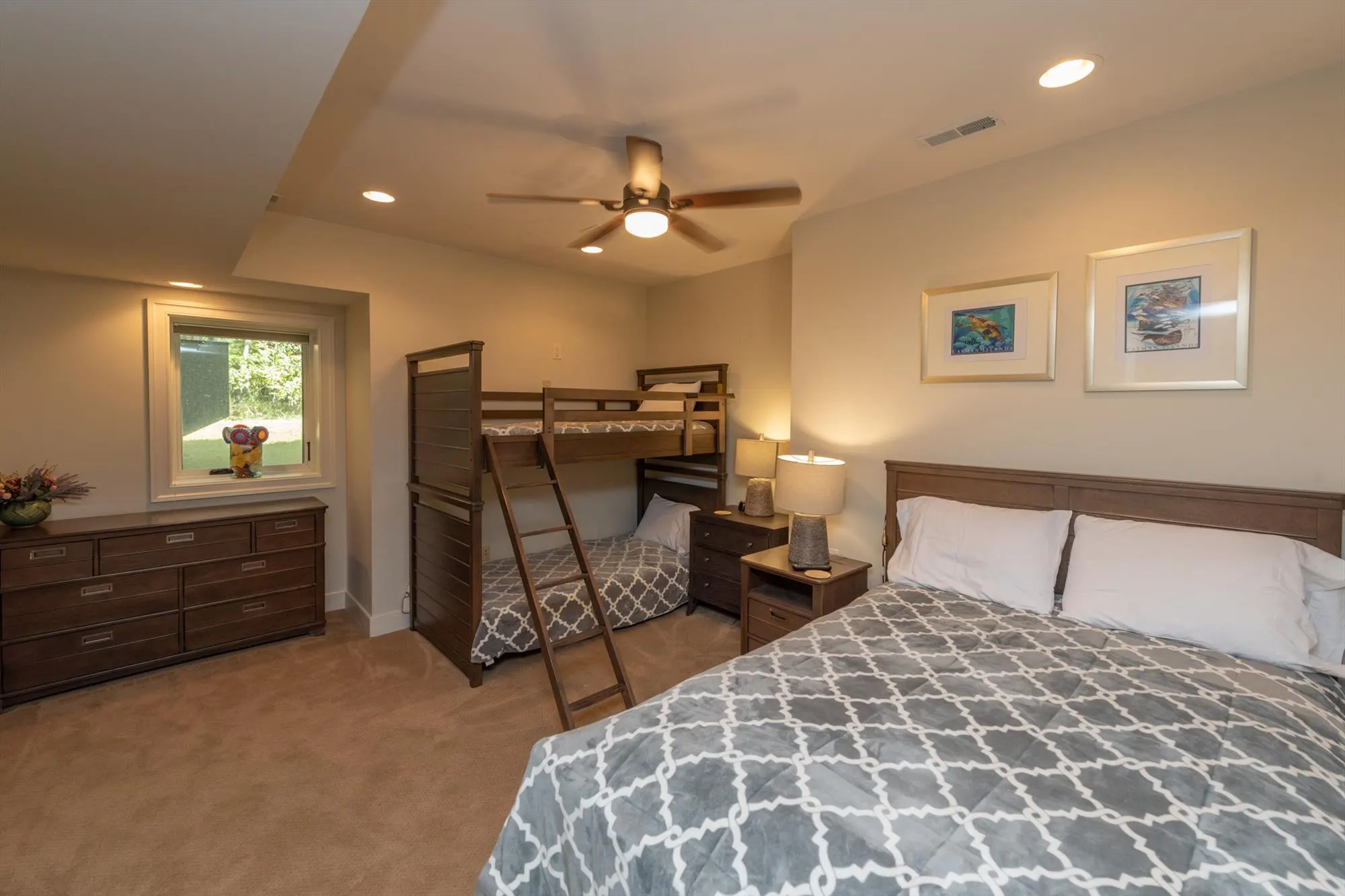 Lower level bunk bedroom ideal for kids with twin-over-twin bunk bed