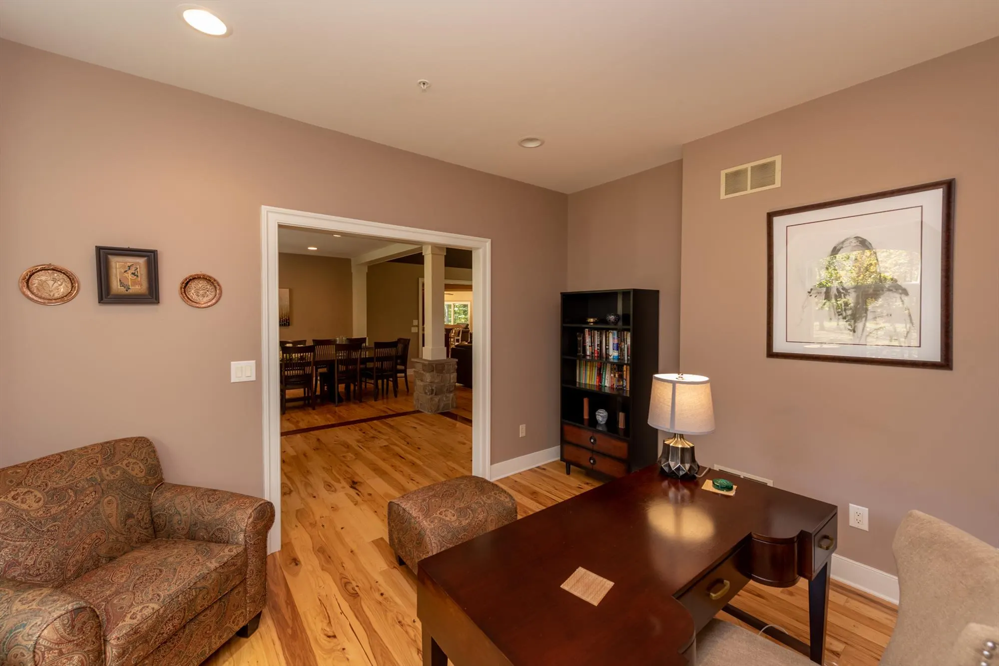 Private home office with desk and workspace for remote work guests
