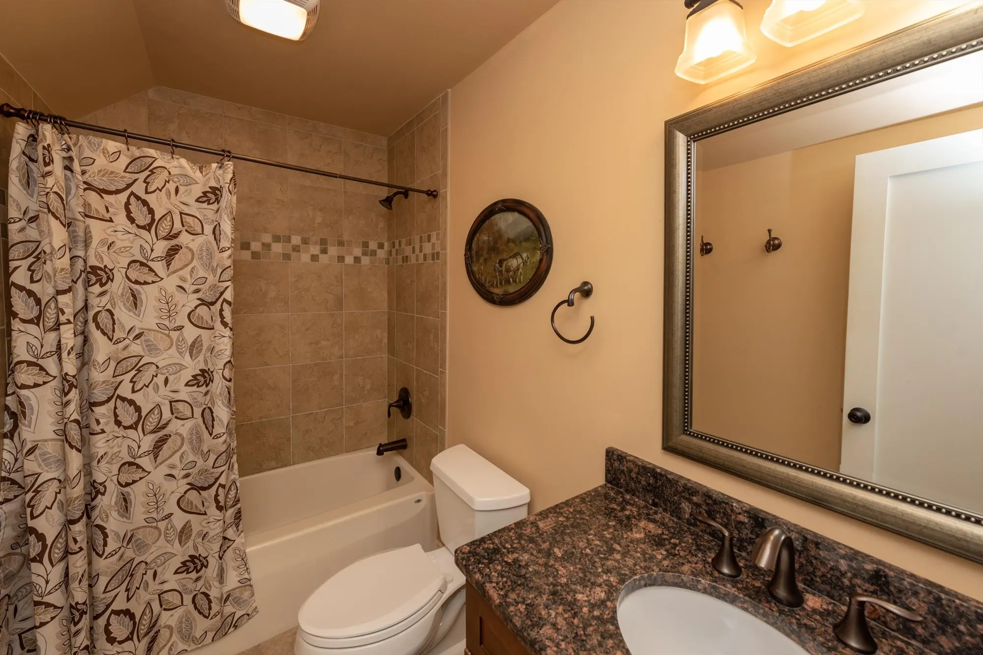 Pool house bathroom with full bath for swimmer convenience