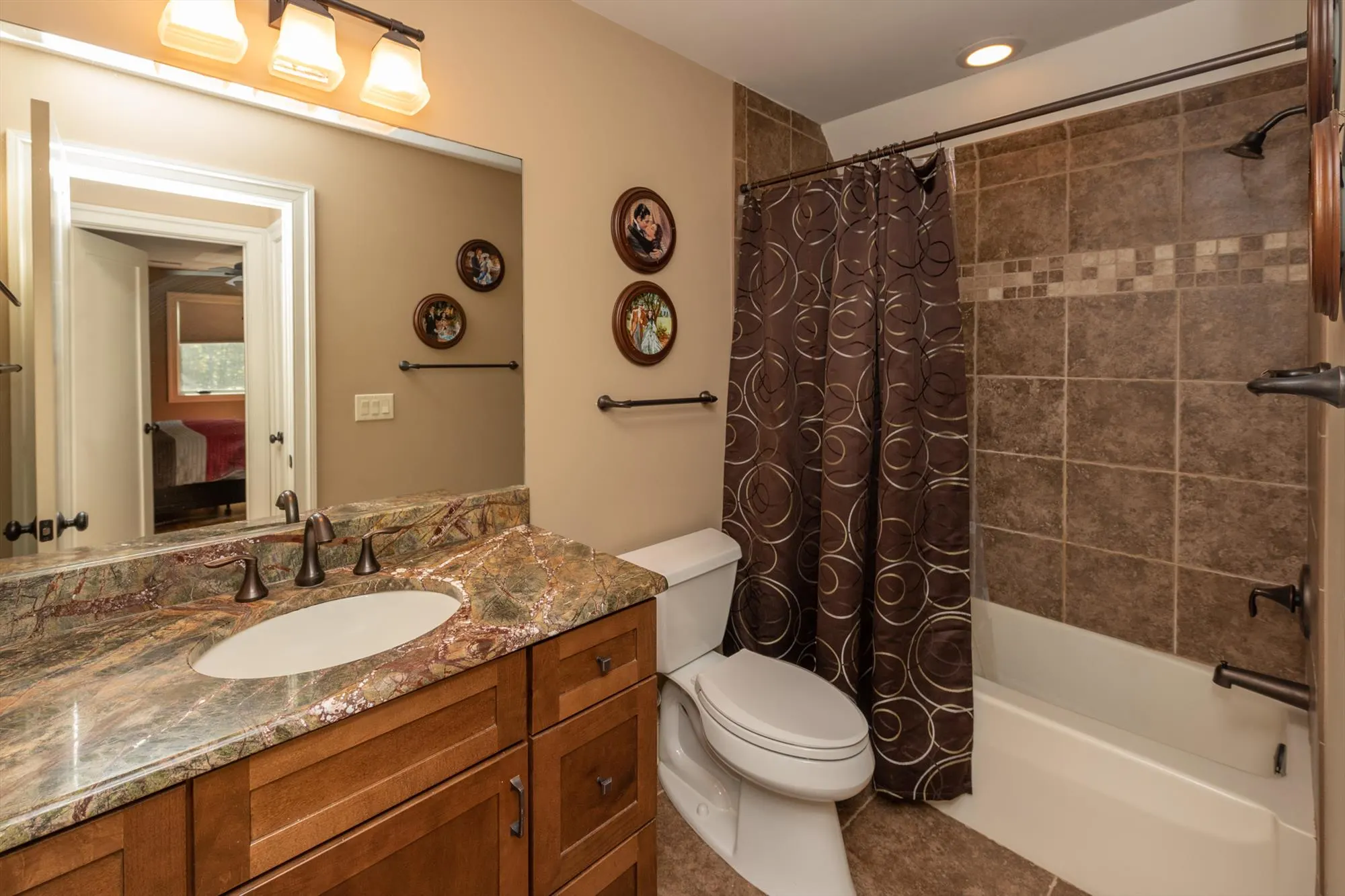 Upper level full bathroom shared between the two upper bedrooms